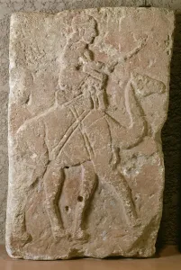 Slab with Dromedary Rider, Tell Halaf, Northern Syria (limestone with red paint) Slab with Dromedary Rider, Tell Halaf, Northern Syria (limestone with red paint)