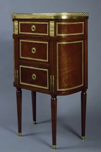 Small Louis XVI style mahogany commode with gilt bronze decoration, 1750-1751, France Small Louis XVI style mahogany commode with gilt bronze decoration, 1750-1751, France