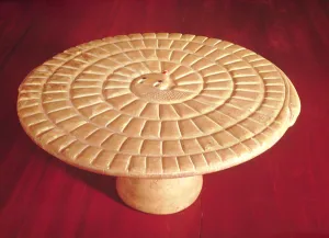 Snake shaped gaming board used for the game mehen, Thinite Period (alabaster) Snake shaped gaming board used for the game mehen, Thinite Period (alabaster)
