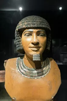 Ancient Egyptian Gallery: Statue of Ptahhotep, old kingdom, (plastered and painted wood)