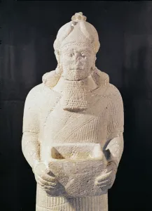 Statuette of a man carrying a box, from Arslan Tach, Syria (stone) (detail) Statuette of a man carrying a box, from Arslan Tach, Syria (stone) (detail)