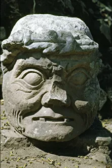 Stone sculpture of a old man head called the old man of Copan, temple 11 Stone sculpture of a old man head called the old man of Copan, temple 11