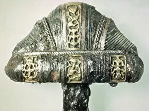 Nordic Gallery: Detail of a sword hilt with stamped decoration (brass and iron)