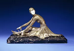 Tamara, a Figure of a Ballerina Tying her Shoe, early 20th century (gilt-bronze, silvered, ivory)