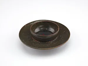 Tea bowl stand, first half of 12th century (stoneware with black slip under celadon glaze) Tea bowl stand, first half of 12th century (stoneware with black slip under celadon glaze)