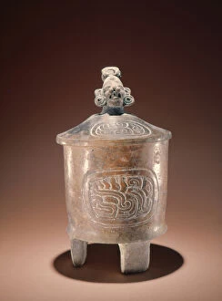 Teotihuacan-style tripod bowl with effigy-head lid found at Tikal (ceramic)