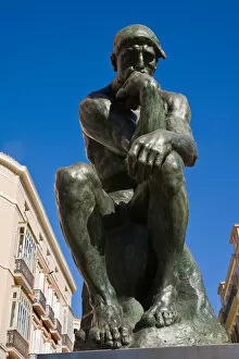 The Thinker by French artist Auguste Rodin on display in Calle Larios Malaga Spain