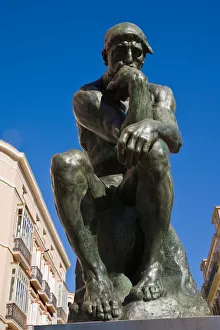 The Thinker by French artist Auguste Rodin on display in Calle Larios Malaga Spain The Thinker by French artist Auguste Rodin on display in Calle Larios Malaga Spain