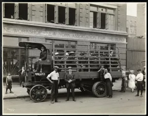 Truckload of blind men ready to depart for a picnic from the Bourne Memorial Building Truckload of blind men ready to depart for a picnic from the Bourne Memorial Building