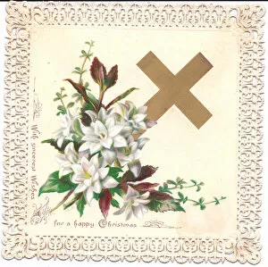 A Victorian Christmas Card of a crucifix and lillies in an intricate square pierced