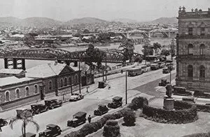 1940 1949 Collection: A view of Brisbane, showing Victoria Bridge, foreground, and Grey Street Bridge (b / w photo)