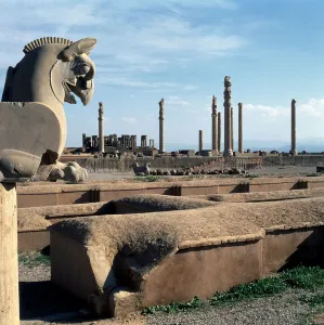 View of the north portico of the Apadana with the Tachara in the background View of the north portico of the Apadana with the Tachara in the background