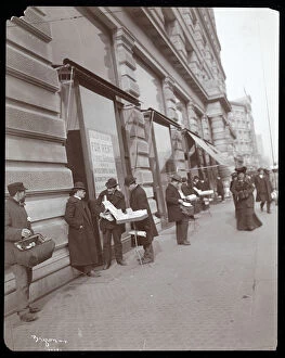 Peddler Gallery: View of peddlers selling toys and other items in front of the Fuller or Flatiron Building