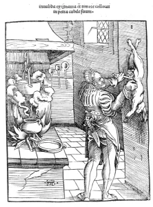 View of a sixteenth century kitchen with cook gutting a rabbit (woodcut) View of a sixteenth century kitchen with cook gutting a rabbit (woodcut)