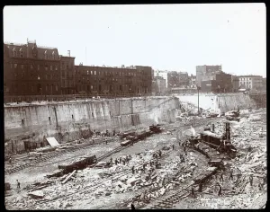 View of workers in the huge excavation for Pennsylvania Station, New York View of workers in the huge excavation for Pennsylvania Station, New York