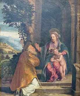 Holy Image Gallery: Virgin with Child and bishop, 1535-40 circa, Battista e Dosso Dossi (oil on panel)