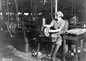 Woman broaching key seat in front sight carrier for rifle, Eddystone Rifle Plant Woman broaching key seat in front sight carrier for rifle, Eddystone Rifle Plant