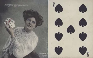 Woman with playing cards and the nine of spades (colour litho) Woman with playing cards and the nine of spades (colour litho)
