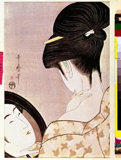 A woman powering her neck with shade Japanese print by Utamaro Kitagawa (1753-1806 A woman powering her neck with shade Japanese print by Utamaro Kitagawa (1753-1806