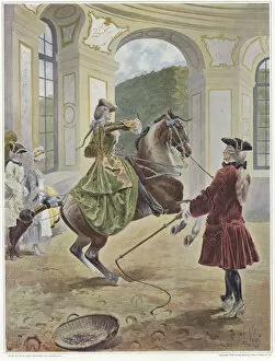A woman riding a horse which is rearing up before a man holding a whip (colour litho)