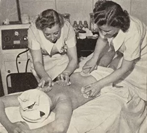 Beauty Therapists Gallery: Women undergoing a body brushing beauty treatment (b / w photo)