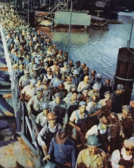 Workers leaving a shipyard in the southern United States at the end of their shift, World War II, 1941-1945 (photo)