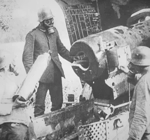 WWI German gunners load poison gas shell wearing gas masks on the Western Front WWI German gunners load poison gas shell wearing gas masks on the Western Front