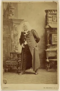 Actor long white wig white bushy eyebrows standing Actor long white wig white bushy eyebrows standing