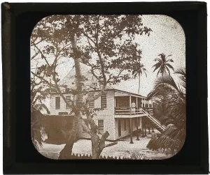 Belize City ADLP standing porch two story white Belize City ADLP standing porch two story white