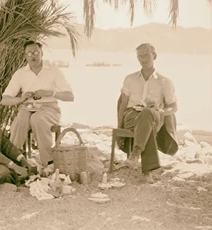 Camp Petra Photograh David Whiting two men eating outdoors Camp Petra Photograh David Whiting two men eating outdoors