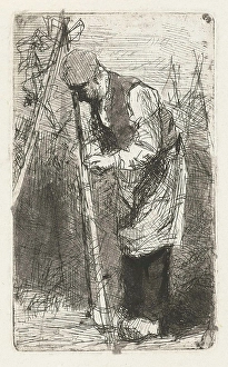 Man binds beans stakes in vegetable garden, print maker: Bernardus Johannes Blommers Man binds beans stakes in vegetable garden, print maker: Bernardus Johannes Blommers