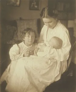 Mother dressing gown seated infant small son Mother dressing gown seated infant small son