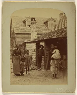 Portrait black family standing front house George Barker Portrait black family standing front house George Barker