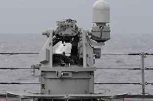 A 25mm machine gun is fired aboard USS Blue Ridge A 25mm machine gun is fired aboard USS Blue Ridge