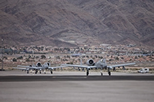 A-10 Thunderbolts taxi to the runway at Nellis Air Force Base, Nevada A-10 Thunderbolts taxi to the runway at Nellis Air Force Base, Nevada