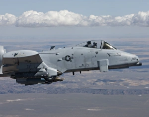 An A-10C Thunderbolt flies over the Saylor Creek bombing range, Idaho An A-10C Thunderbolt flies over the Saylor Creek bombing range, Idaho