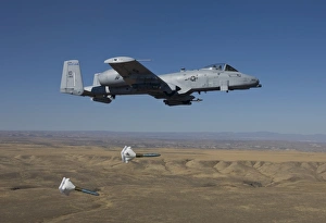 An A-10C Thunderbolt releases two High Drag BDU-50s over Idaho An A-10C Thunderbolt releases two High Drag BDU-50s over Idaho