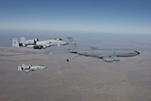 Two A-10C Thunderbolts prepare to refuel from a KC-135 Stratotanker Two A-10C Thunderbolts prepare to refuel from a KC-135 Stratotanker