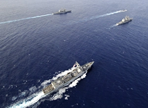 Aerial view of a naval fleet transiting the Pacific Ocean Aerial view of a naval fleet transiting the Pacific Ocean