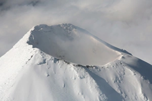 Aerial view of summit of Shishaldin Volcano, Unimak Island, Alaska Aerial view of summit of Shishaldin Volcano, Unimak Island, Alaska