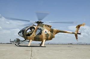 An Afghan Air Force MD-530F helicopter at Shindand Air Base An Afghan Air Force MD-530F helicopter at Shindand Air Base
