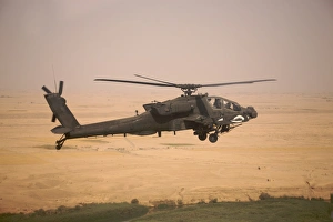 AH-64D Apache helicopter on a mission over Northern Iraq AH-64D Apache helicopter on a mission over Northern Iraq