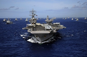 Aircraft carrier USS Ronald Reagan leads a mass formation of ships through the Pacific Aircraft carrier USS Ronald Reagan leads a mass formation of ships through the Pacific