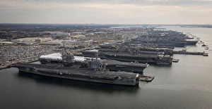 Aircraft carriers in port at Naval Station Norfolk, Virginia Aircraft carriers in port at Naval Station Norfolk, Virginia