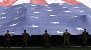 Images Dated 22nd December 2006: Airmen present the American Flag during the National Anthem