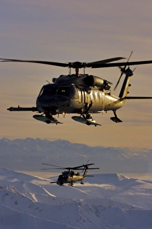Two Alaska Air National Guard HH-60G Pave Hawks in flight over Alaska Two Alaska Air National Guard HH-60G Pave Hawks in flight over Alaska