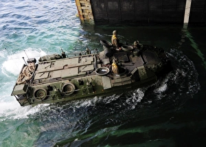 An amphibious assault vehicle enters the well deck of USS Germantown An amphibious assault vehicle enters the well deck of USS Germantown