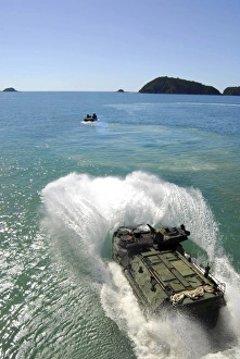 Amphibious Assault vehicles exit the well deck of amphibious transport dock ship Amphibious Assault vehicles exit the well deck of amphibious transport dock ship
