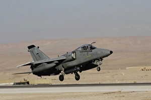 An AMX fighter-bomber of the Italian Air Force taking off An AMX fighter-bomber of the Italian Air Force taking off