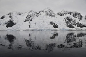 Antarctic mountains reflected in the sea, Antarctica Antarctic mountains reflected in the sea, Antarctica